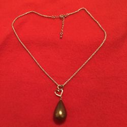 Silver and pearl necklace. Pear is rather large