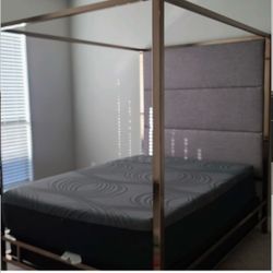 Four-Post Canopy Bed with Upholstered Headboard