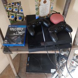 PS4 With 2 Controllers And Games