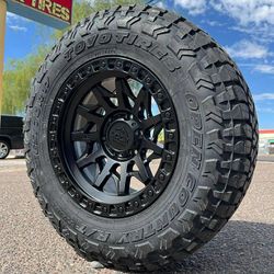 17x9 Lock Off-Road Wheels And Tires 265/70/17 Toyo RT
