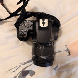 Canon Eos Rebel SL 3 SLR camera 