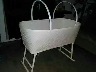 Vintage Redmon Baby wicker bassinet on wheels