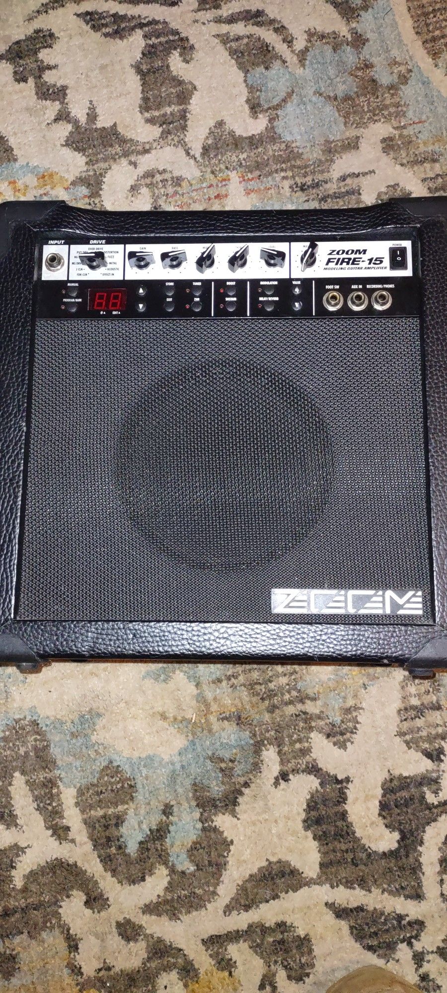 Used in excellent working condition Zoom Fire-15 guitar amp.