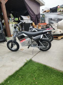Razor Dirt Rocket MX350 - Black with Decals, up to 14 mph, 24V Electric Dirt Bike for Child 8+