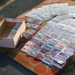 Basketball football and baseball cards