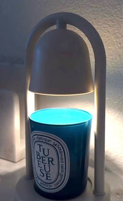 New Vivitar Small Candle Warmer Lamp The electric device is designed to melt jar candles safely from the top down using a built-in halogen heating b