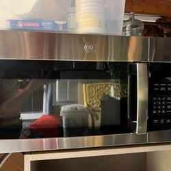 GE MICROWAVE AND OVEN BRAND NEW