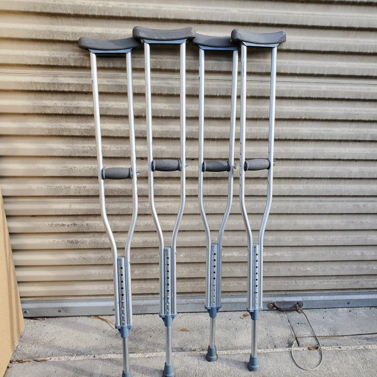 Two Pairs Of Crutches Adjustable Nice Condition