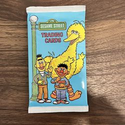 SESAME ST AND POKÉMON TRADING CARDS.
