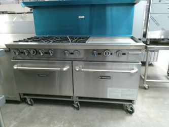 NEVER USED DUKERS 60" L RANGE WITH 6 BURNERS, 2  STANDARD OVENS, AND NATURAL GAS.
