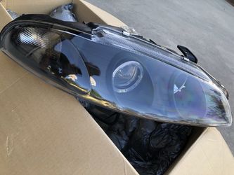 1997-99 Mitsubishi eclipse Projector headlights.