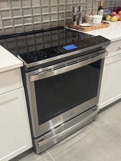 GE Profile 30" Smart Slide-In Fingerprint Resistant Front-Control Induction and Convection Range with No Preheat Air Fry