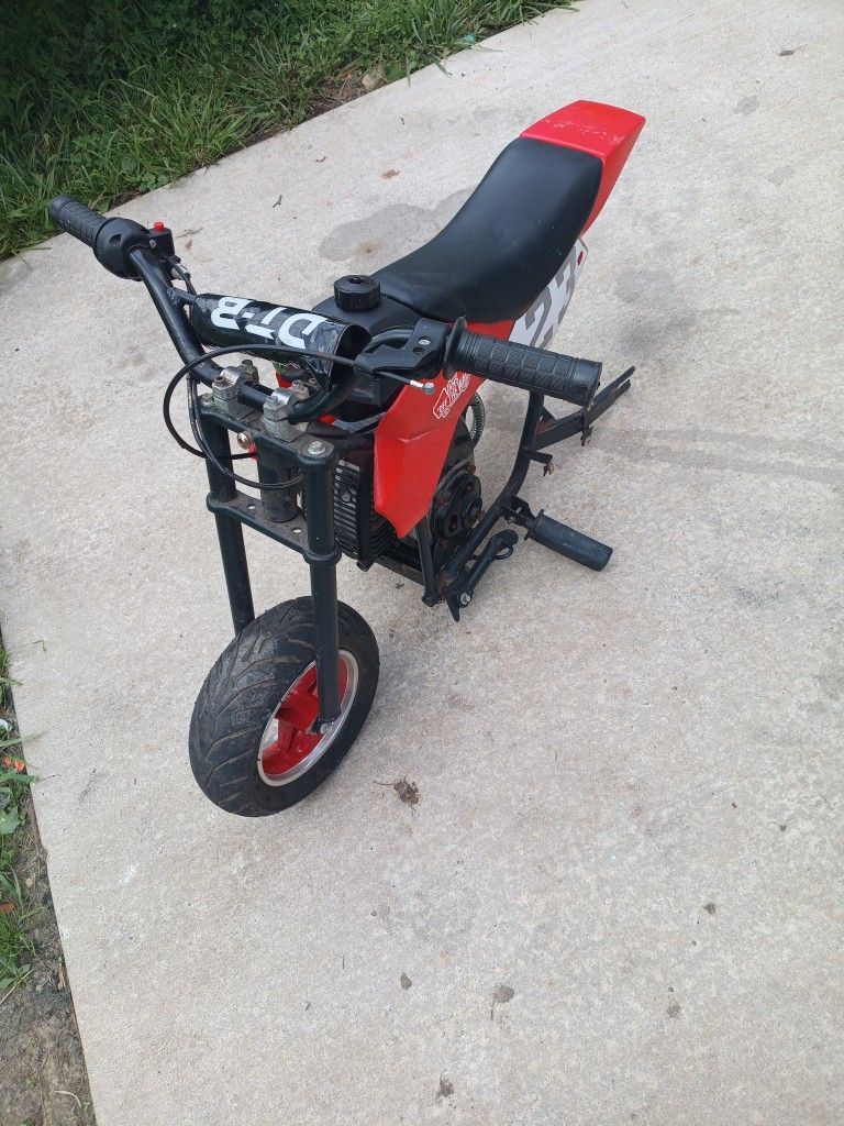 Mini Gas Power Bike Gas Front Tire And Chain The Another Tire On Rim And The Air Tube