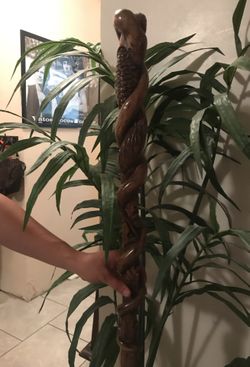 Hiking stick hand made on one piece.Unique piece. Has a snake devouring a dove. / baston para la Montana echo a mano
