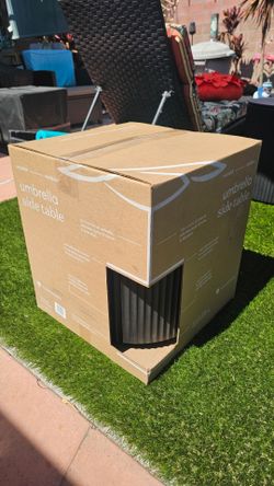 Umbrella table base. NEW