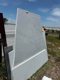 Granite Quartz countertops Material fabrication and install 40 dollars per square foot free sink