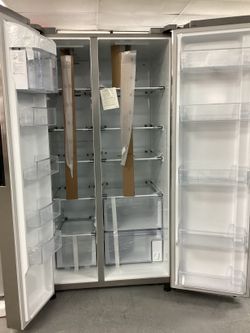 Samsung Side-by-Side Refrigerator in Bright LED Lighting with Fingerprint Resistant Finish and Stainless steel