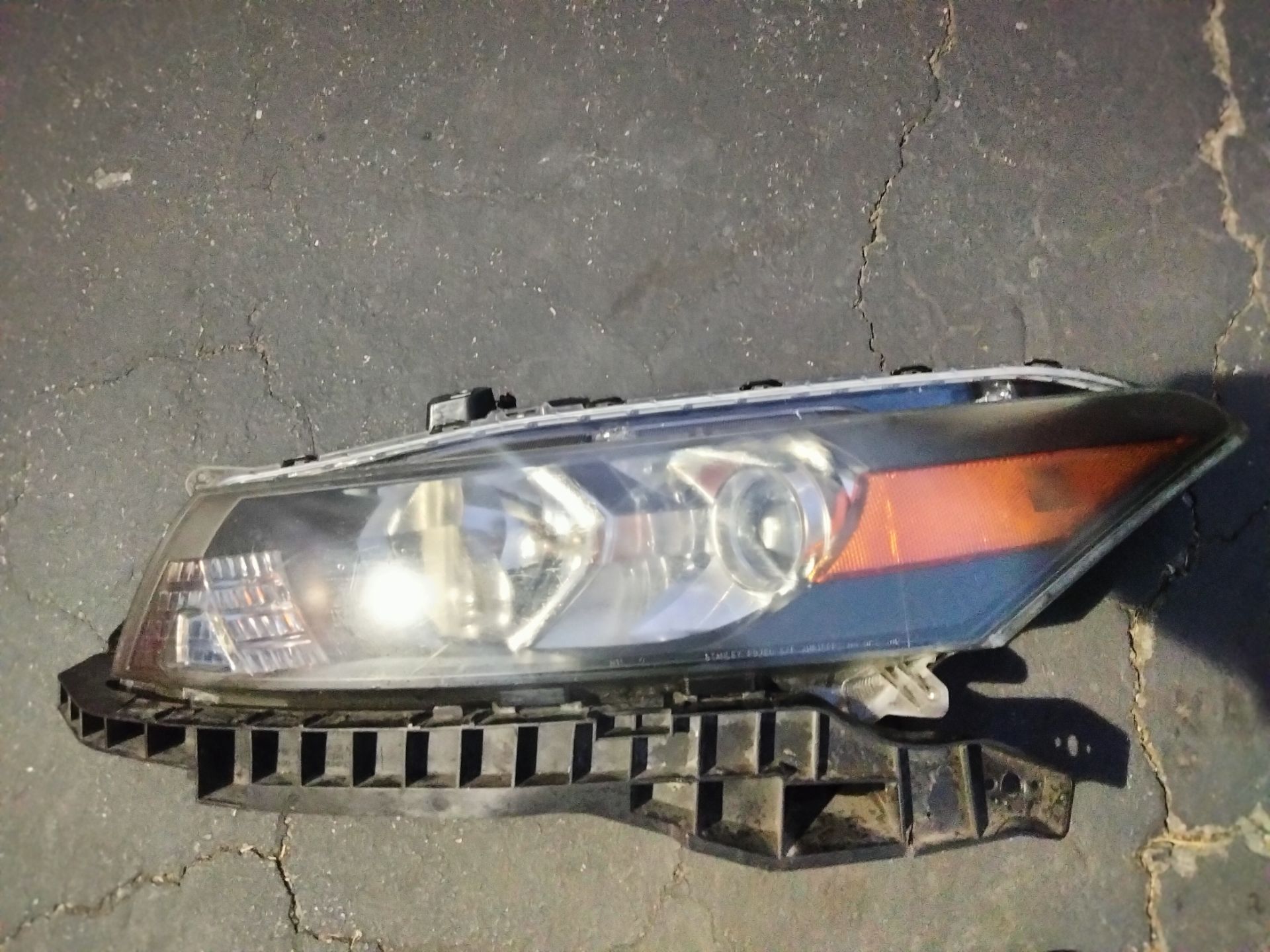 2008-2012 Honda Accord Coupe headlight (driver's side) with headlight bracket OEM.