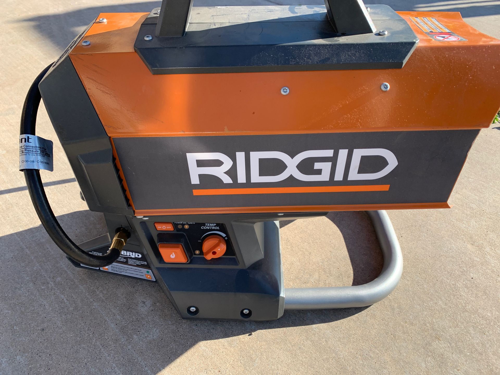 RIDGID 18Volt 60K BTU Hybrid Forced Air Propane Portable Heater for