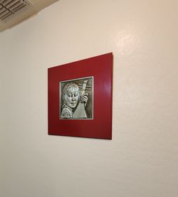 Mid-Century Modern bas-relief metal sculpture by artist Bruce Fox - "Portrait with Mandolin"