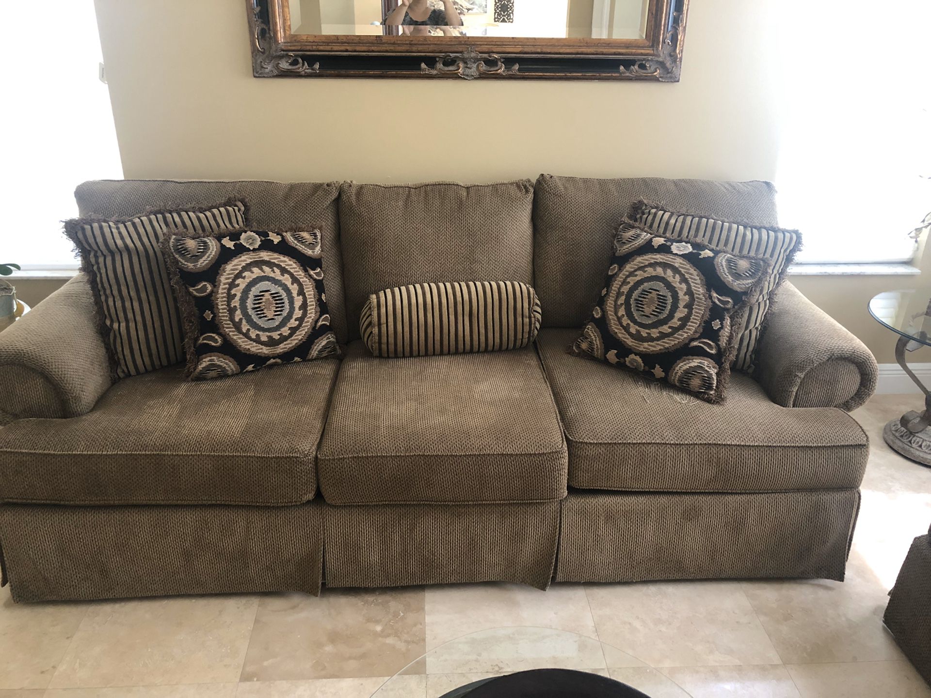 Free. Sofa and love seat. Little damage. Nice couch
