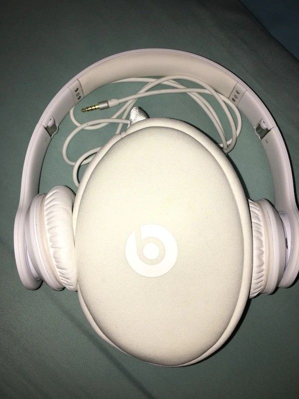 White beats with. White Carry case $50