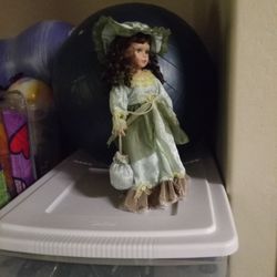 Beautiful Porcelain Doll 17.5 Inches Tall With Lots Of Accessories On Her, The Neckless, Purse And Shoes.