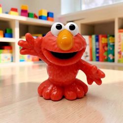 2013 ELMO Hasbro Sesame Street 2.5" PlasticPVC Lightweight Pocket Action Figure No accessories included. This is Elmo, a character from the children's