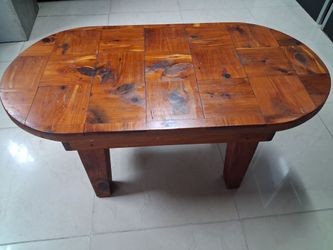 Oval brown wood center/coffee table