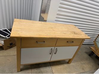 kitchen unit with a wood butcher-block top