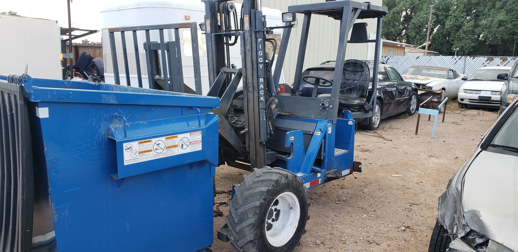 2006 International 4400 DT Flatbed 26ft With piggyback forklift low miles. MONEY MAKER. 34999.00 TODAY!