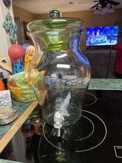 Clear Tall Cantainer That Holds Cold Beverages  Glass