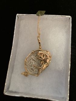 Atocha silver coin gold dolphin bezel