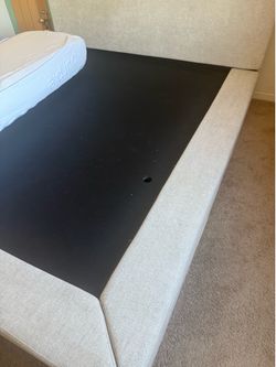 Langford Queen Bed Frame with two pillows