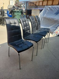 4 Faux Leather Chairs 