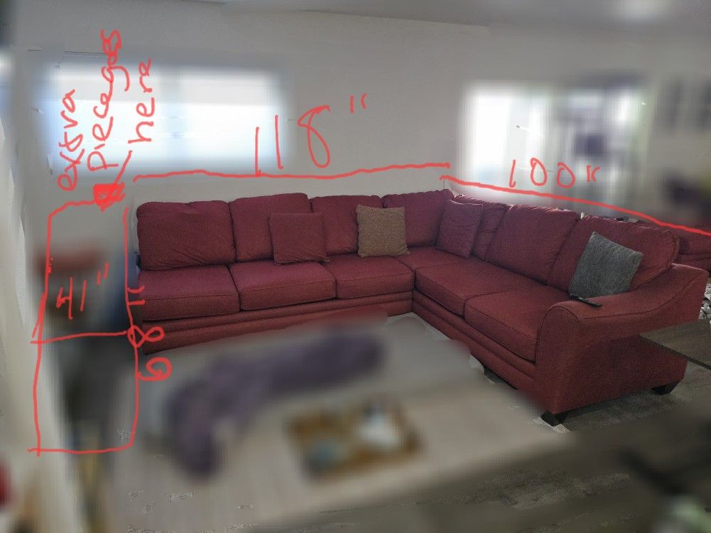 Living Spaces Large Couch Red. Been Covered. 