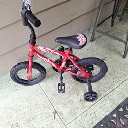 13 inch  huffy rock it bike with training wheels
