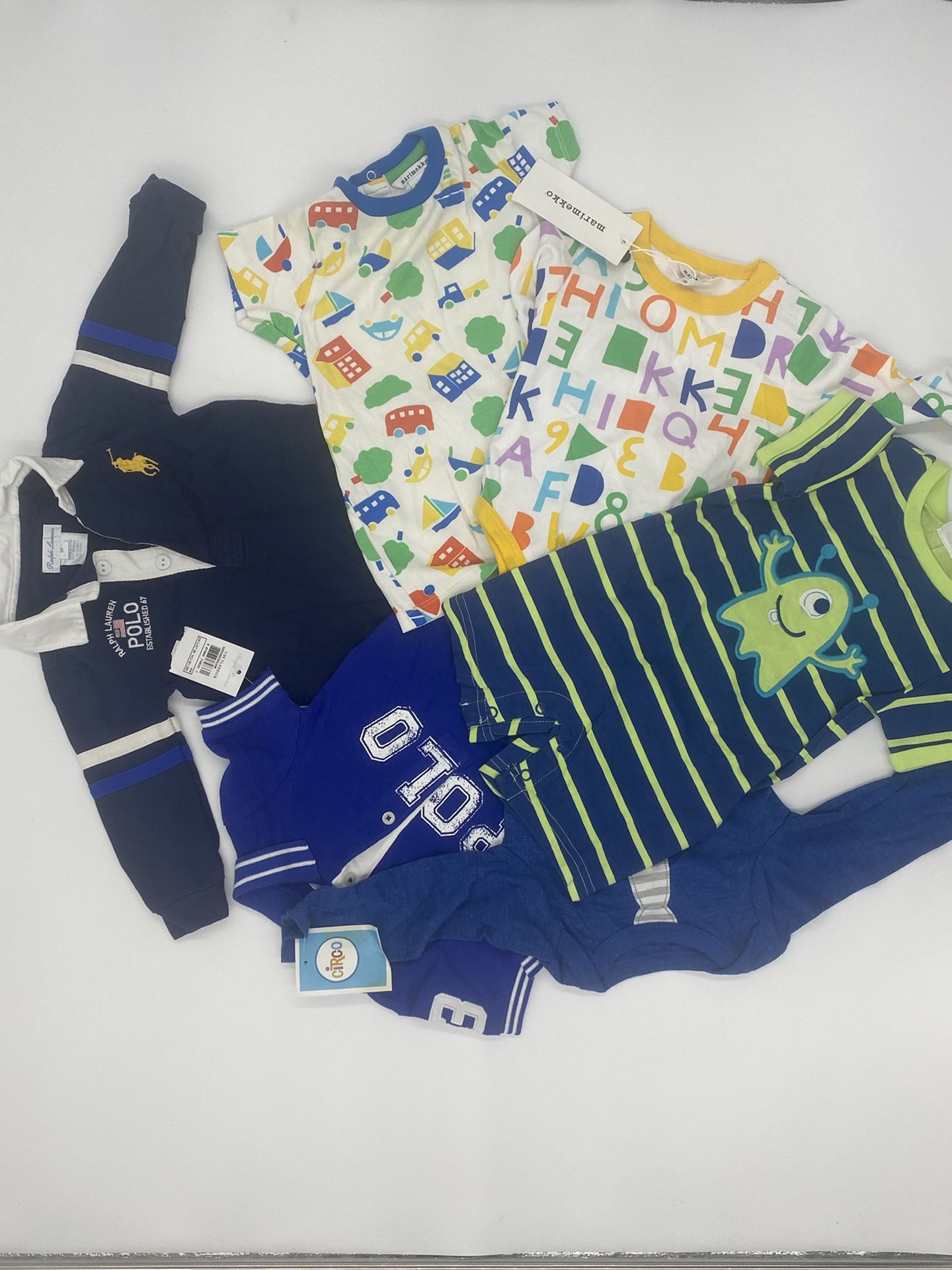 7 Designer Onesie Mostly New