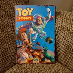 DISNEY "TOY STORY" METAL SIGN.  12" X 8".  NEW.  PICKUP ONLY.