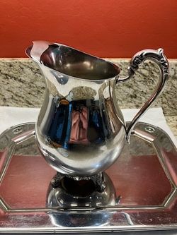 E. B. Rogers Silver Company Pleated Footed Pitcher