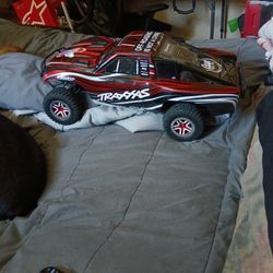 Traxxas Slash Few Months Old But In Good Working Condition Have Battery And The Remote And Charger
