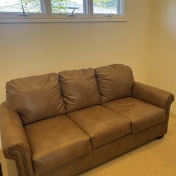 Brown Leather Sleeper Couch: 78”wide x 38”deep x 36”high