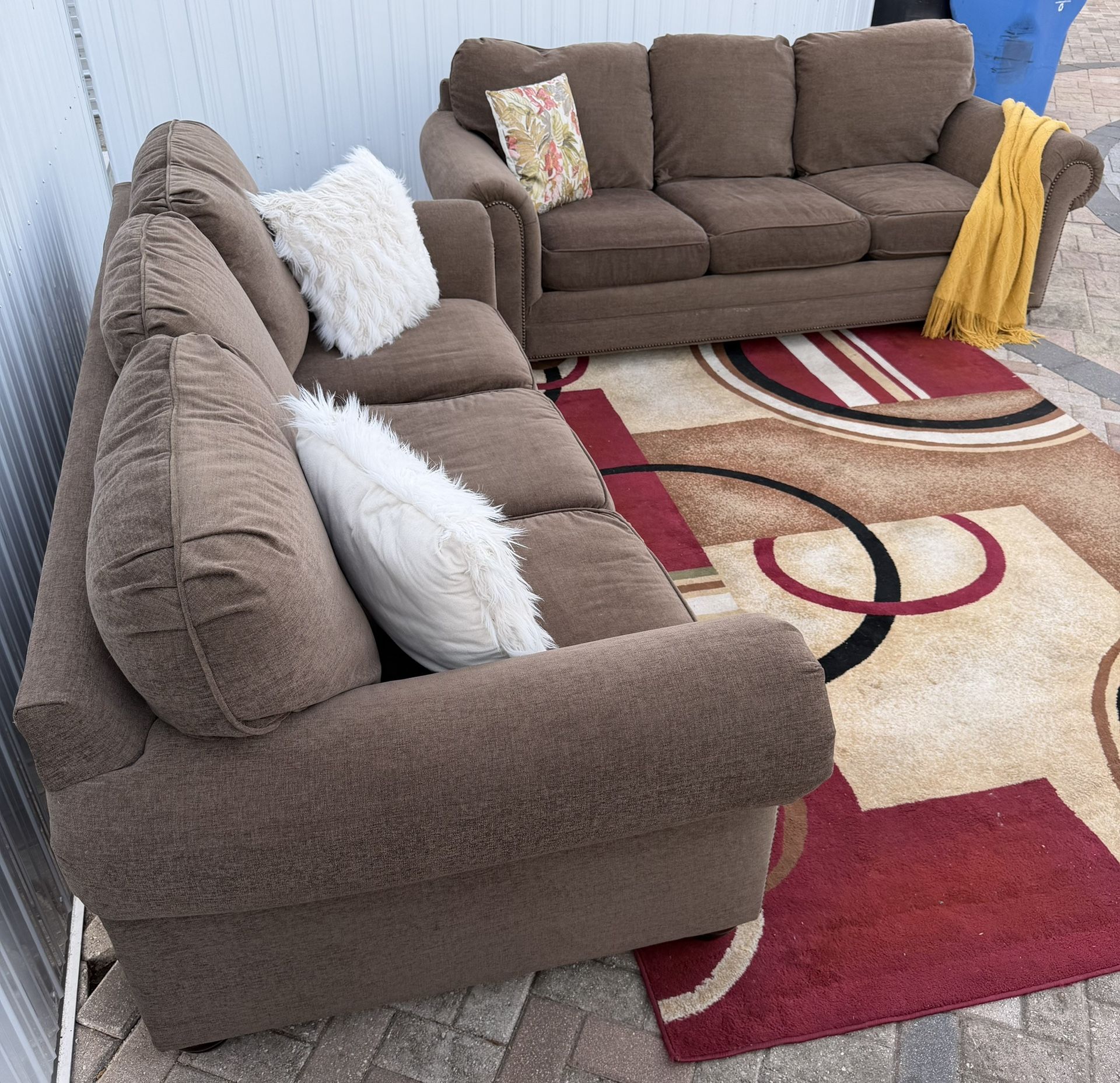 Set of brown sofas from Bassett Furniture. Delivery available for an additional cost. 