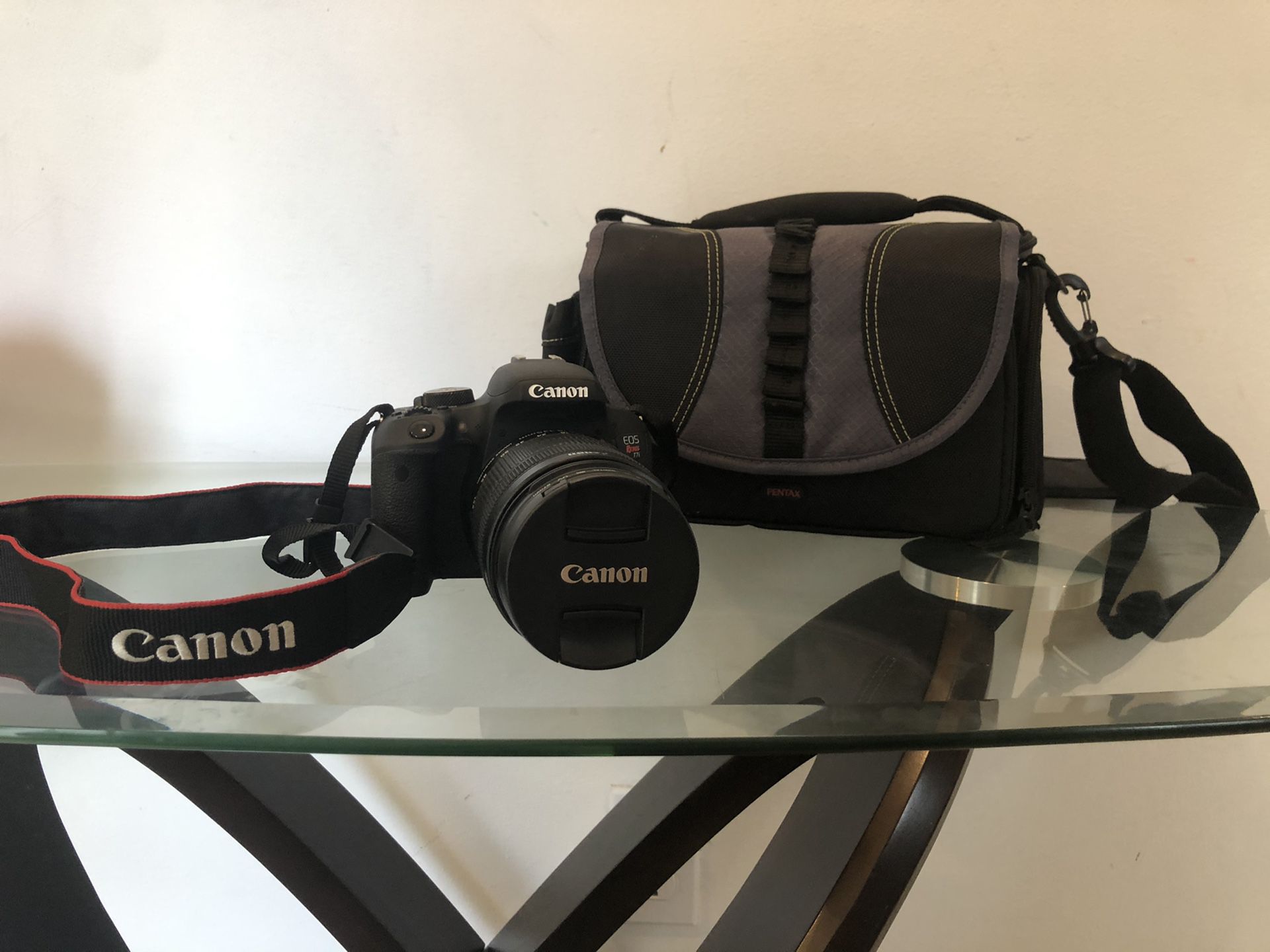 Like New, Canon EOS Rebel T7i 24.2MP Digital SLR Camera Bundle with EF-S 18-135mm STM Lens, 32GB SD Card, and Camera Bag