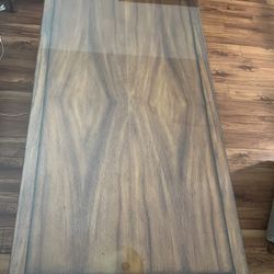 Nice Rectangle Coffee Table With Top Cover Glass and 2 Dark Brown Trays.