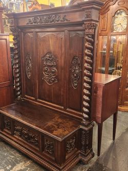 Antique Spanish Renaissance Revival carved walnut hall bench .