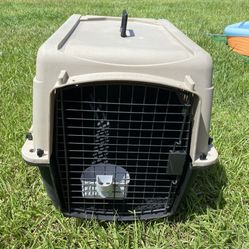 Dog travel Kennell with food bowl. Height 20” Width20” Lenght 28”
