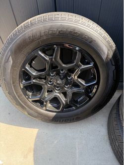 2025 Ford F-150 STX 18-inch gloss black aluminum STX wheels.