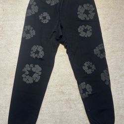 Black denim tear sweatpants