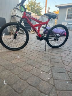 Selling bike Red has a cool sticker on the front